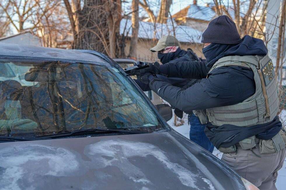 image for Immigration agents draw guns and arrest activists following them in Minneapolis