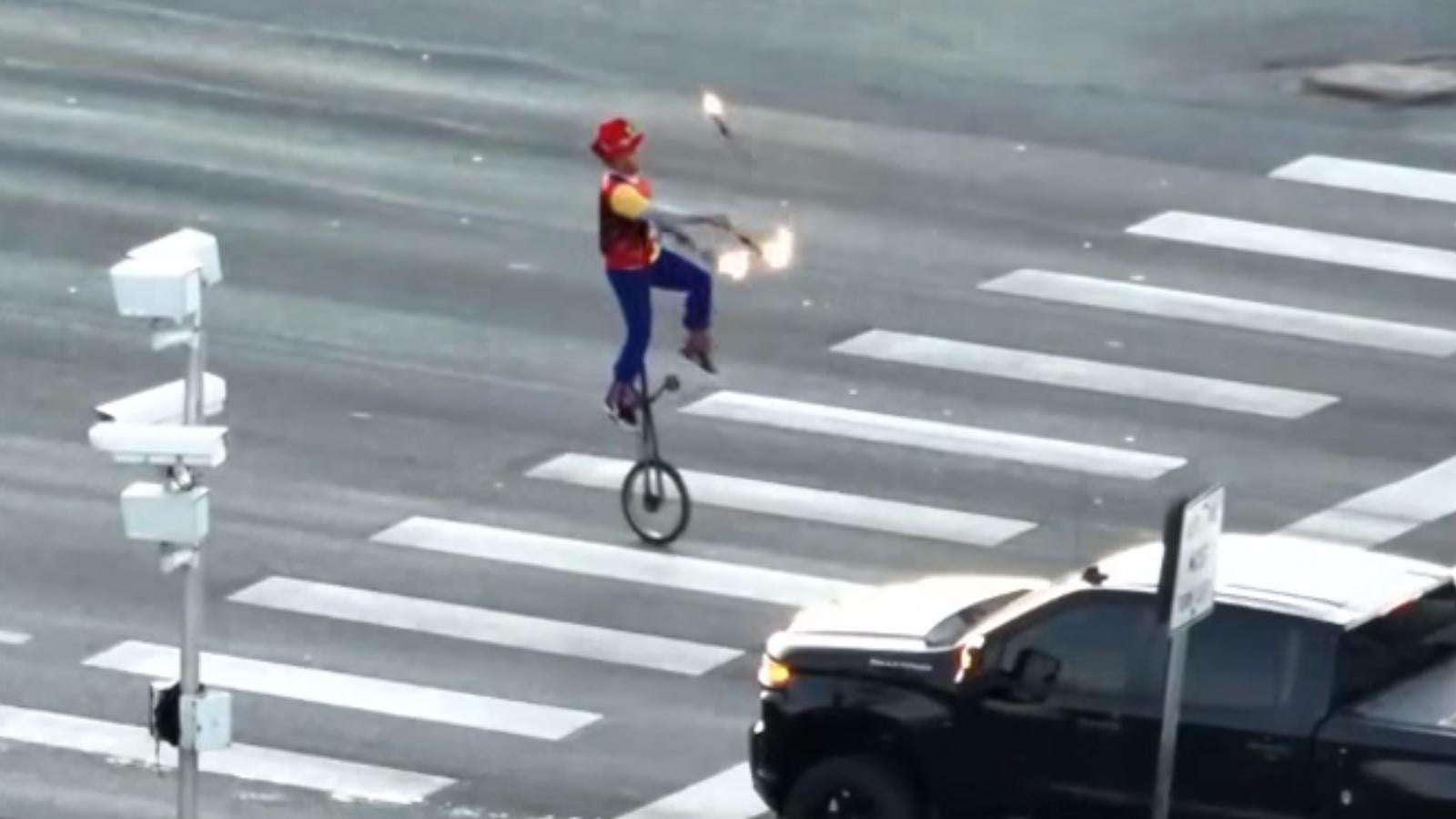 image for Police warn unicyclist to stop juggling fire at intersection, admit act was “quite good”