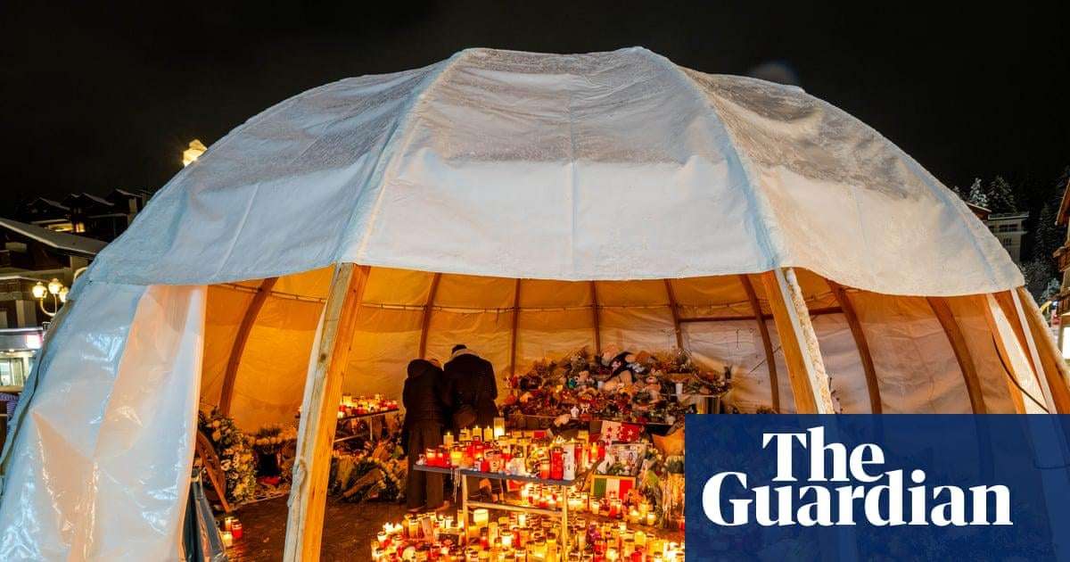 image for Memorial for Swiss bar fire victims goes up in flames