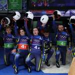 image for OC: Ukrainians kneel after luge team mixed relay for teammate disqualified for helmet with war dead