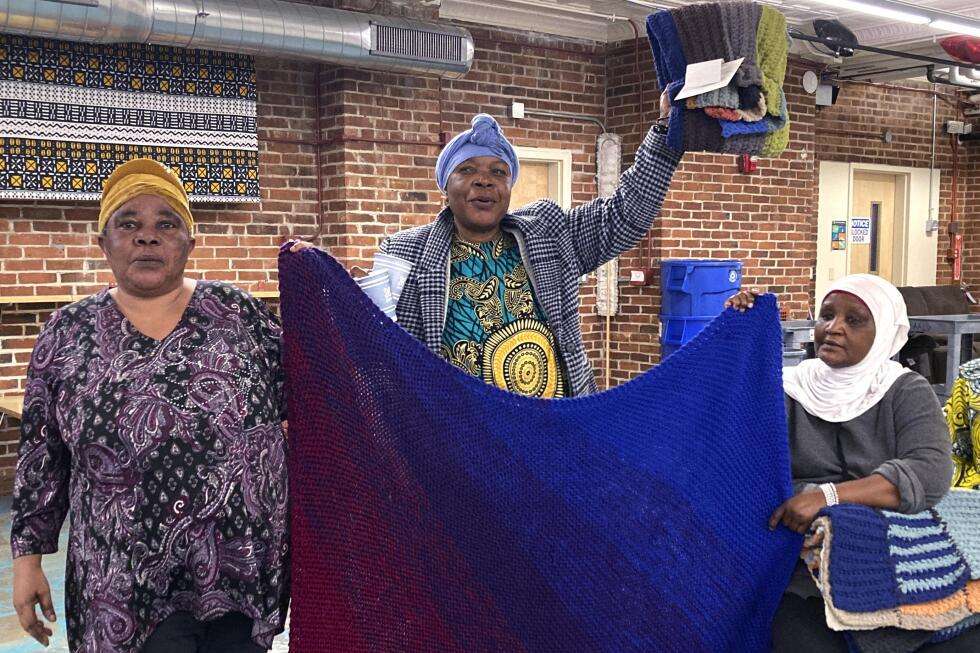 image for Handmade blankets welcome refugees, immigrants to US