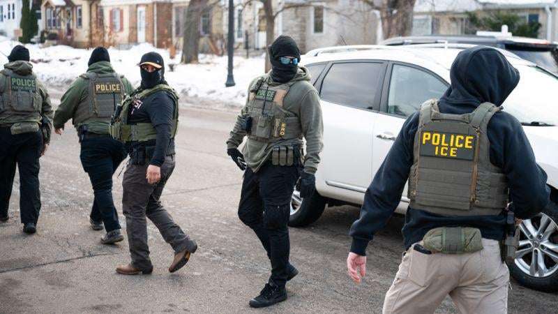 image for ICE officers on leave while feds investigate the shooting of a Venezuelan man in Minneapolis