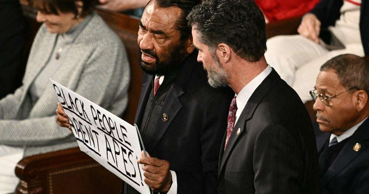 image for Rep. Al Green ejected from Trump's State of the Union after holding a 'Black People Aren't Apes' sign