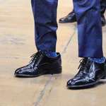 image for Marco Rubio wearing oversized shoes that Trump ordered for him by just guessing his size.