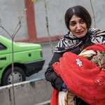 image for Iranian woman weeps the destruction of her home after US-Israeli strikes