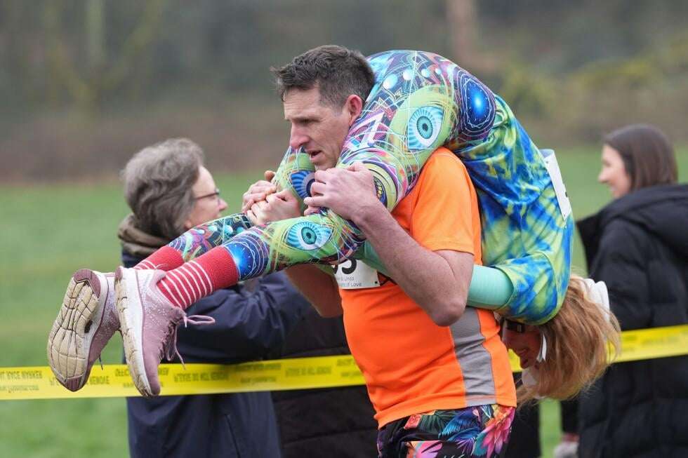 image for Finnish pair wins a barrel of ale in annual ‘wife-carrying’ contest in England