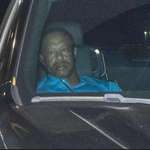image for Tiger Woods leaving jail last night in the passenger seat