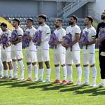 image for Iranian soccer team carries backpacks to protest the strikes on an elementary school in Iran