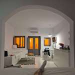 image for [OC] View inside our Santorini Airbnb as Saharan dust turned the Greek sky orange, April 1st.