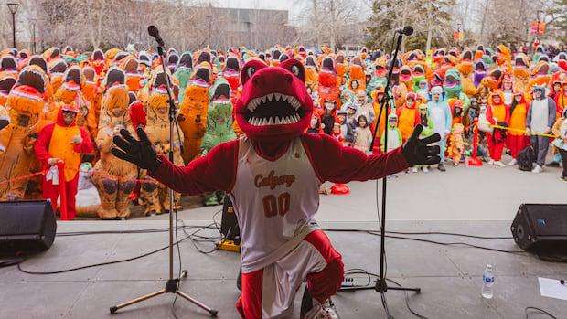 image for University of Calgary sets record for largest gathering of people dressed as dinosaurs