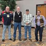 image for Wisconsin Ojibewa leaders pose with conservationist Democrat running for congress in WI-7. (OC)