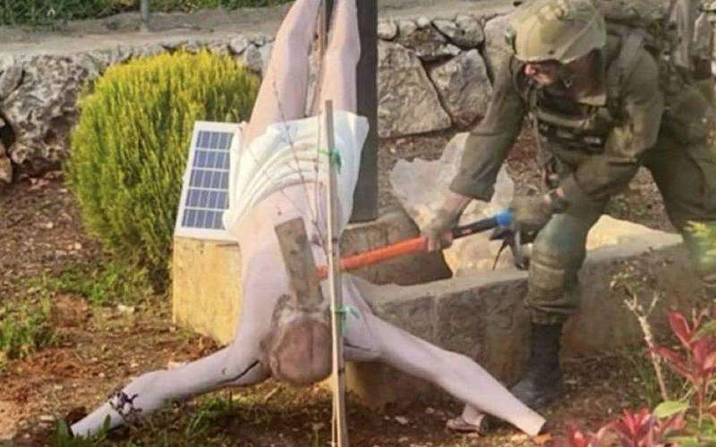 image for Israel news: Israeli Defence Forces IDF confirms photo of soldier smashing a statue of Jesus Christ in Lebanon is real