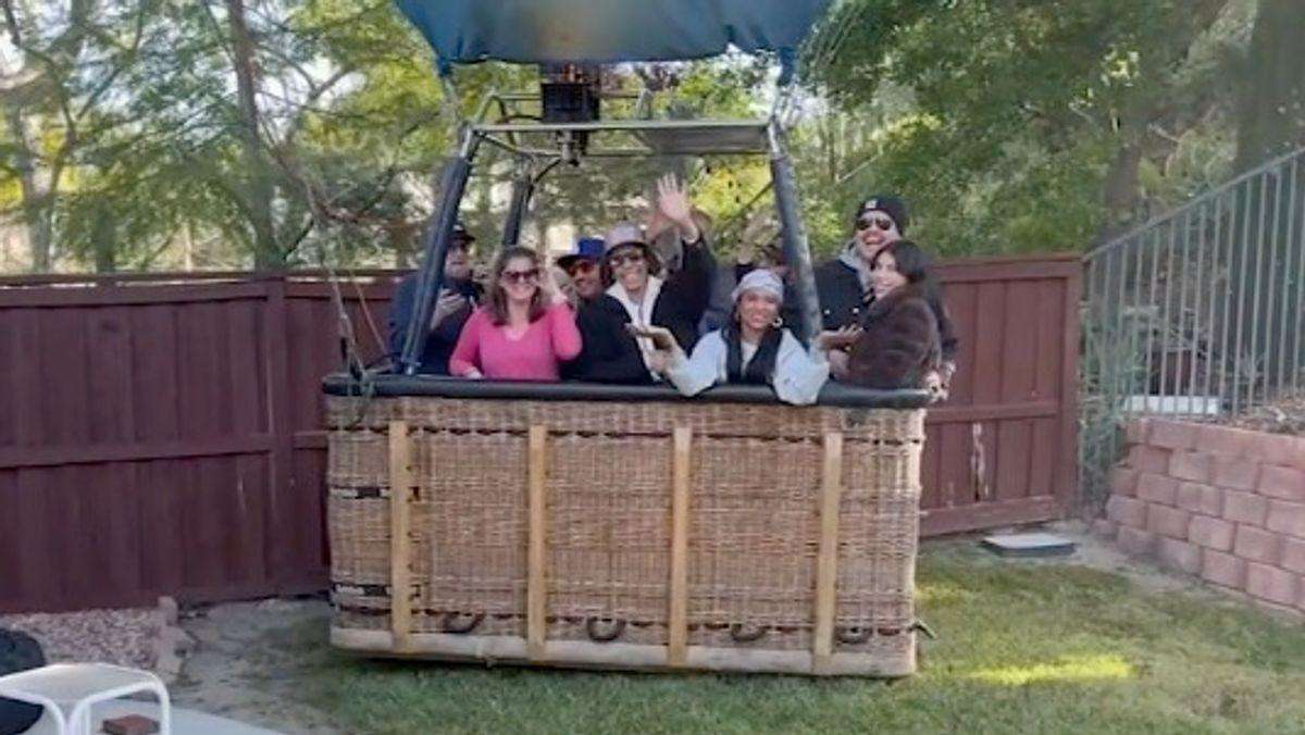 image for Homeowner stunned as hot air balloon carrying 13 makes emergency landing in backyard