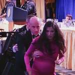 image for Stephen Miller using pregnant wife as human shield.
