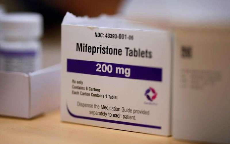 image for Court restricts abortion access across the US by blocking the mailing of mifepristone