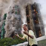 image for A man screams after his final call with his wife, trapped inside this burning building. Hong Kong.