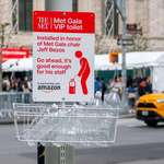 image for Art at Met Gala calls out Bezos for workers having to piss in bottles to avoid being punished. (OC)