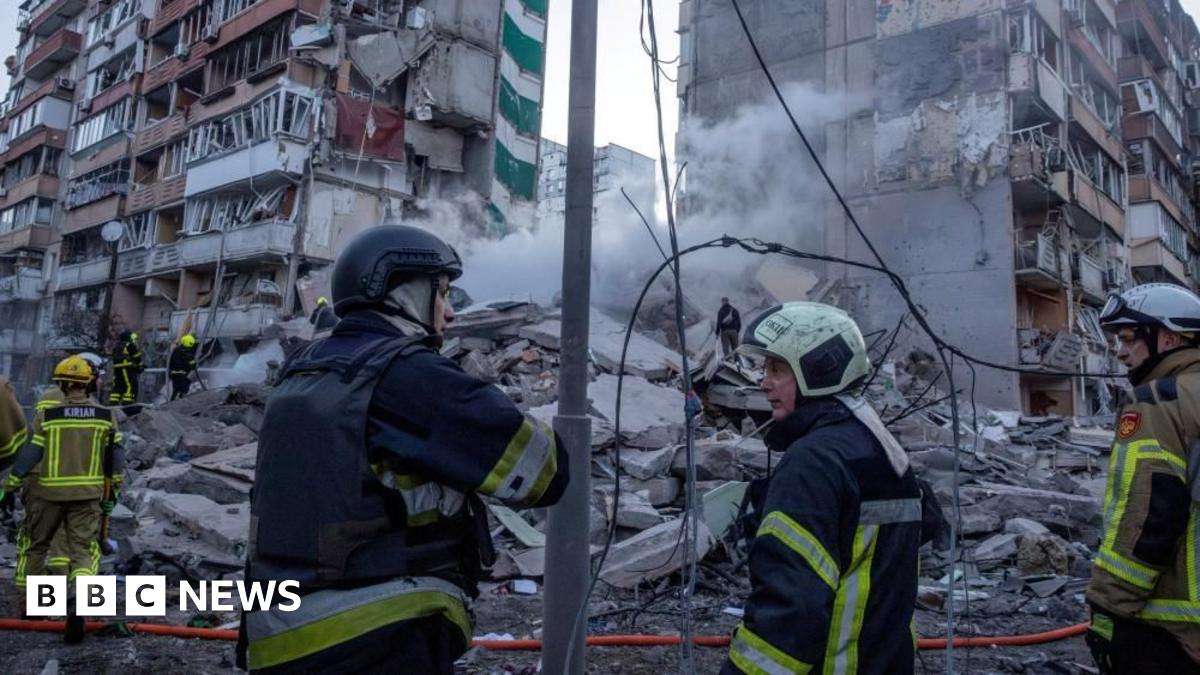 image for Ukraine rescuers pull dead from rubble of Kyiv flats after massive Russian strikes