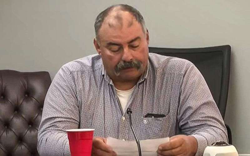 image for School board member who hugged teen and called her ‘hot’ is charged with assault