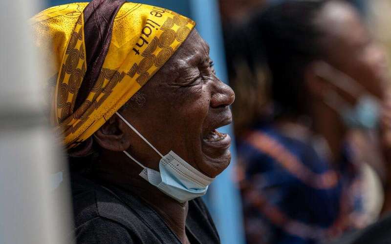 image for Residents burn an Ebola treatment center in Congo as anger grows over the outbreak