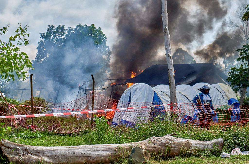 image for Eighteen suspected Ebola patients escape after treatment tent is set on fire for a second time in Congo