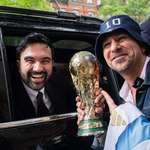 image for zohran mamdani celebrating with a replica world cup trophy after getting 50 dollar nyc tickets.