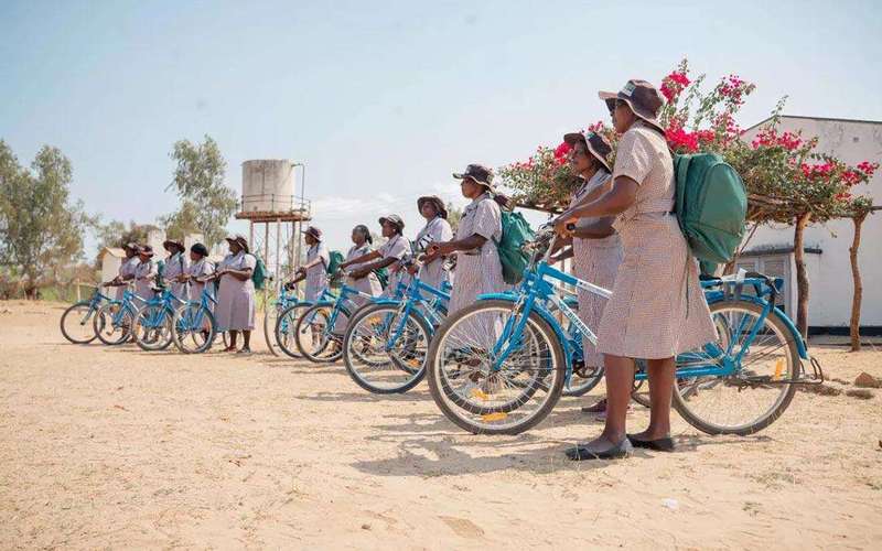 image for In rural Zimbabwe, ‘vaccine cyclists’ brave heat, dust and elephants to get girls protected from cancer