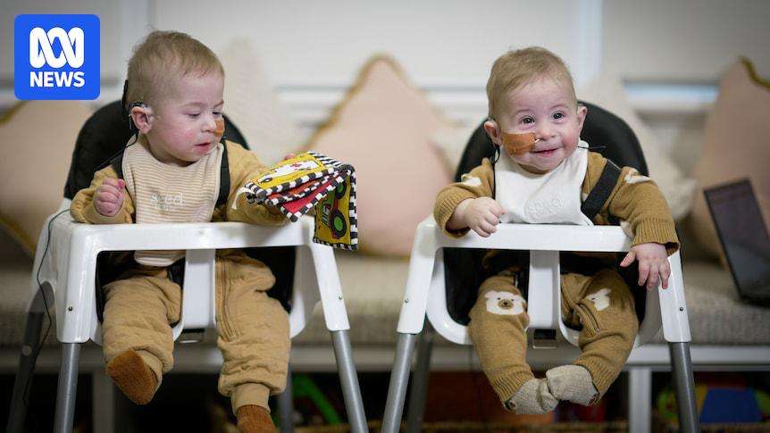 image for Australian-first surgery allows baby twins who were born deaf to hear mum’s voice at the same time