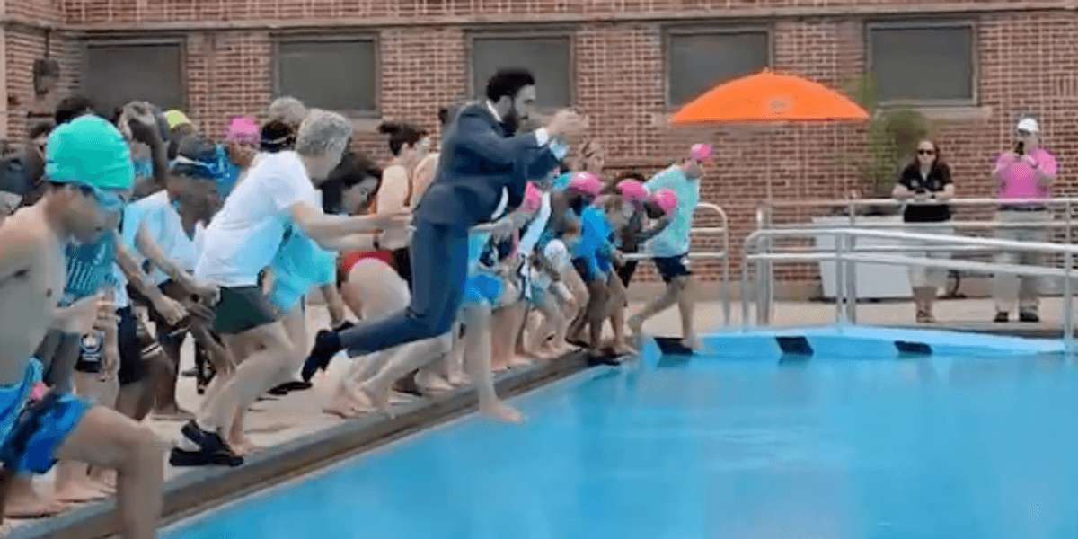 image for As Trump's Reflecting Pool Disaster Turns 'Dystopian,' Fully-Dressed Mamdani Jumps Into NYC Public Pool With a Joyful Smile