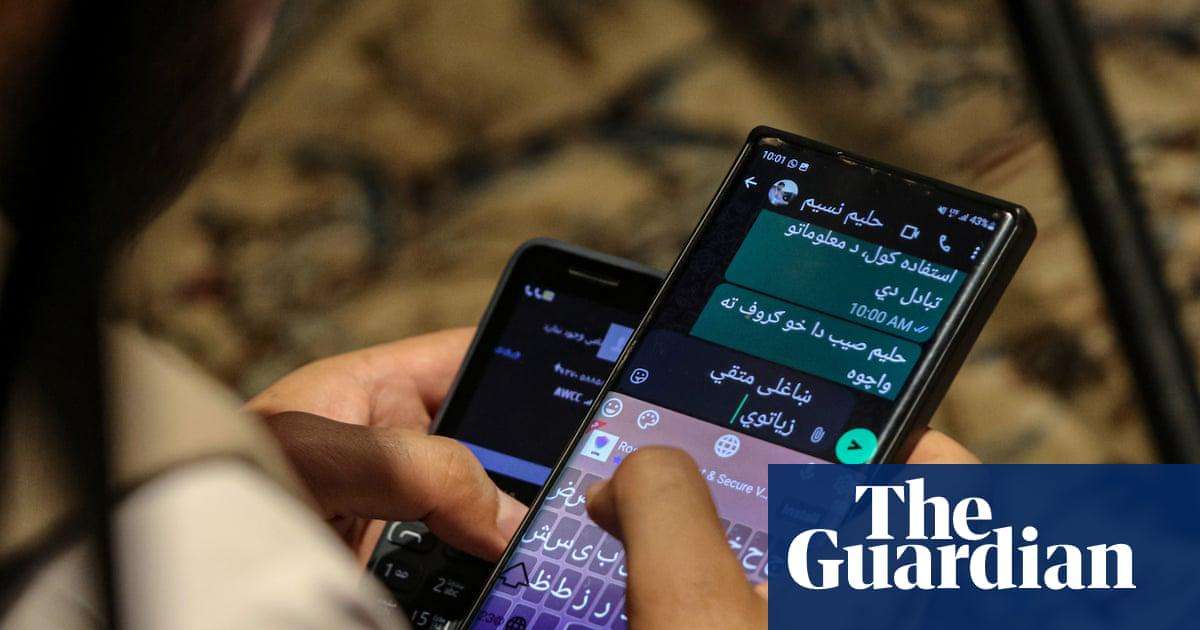 image for Taliban order ban on smartphones as officials shown destroying devices