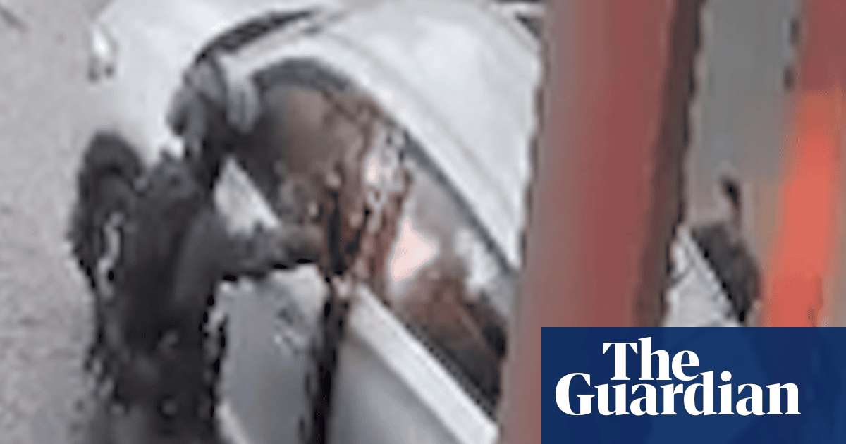 image for Israeli officer shown throwing stun grenade into car during West Bank raid