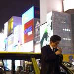 image for [OC] A man having a smoke outside his taxi in Osaka