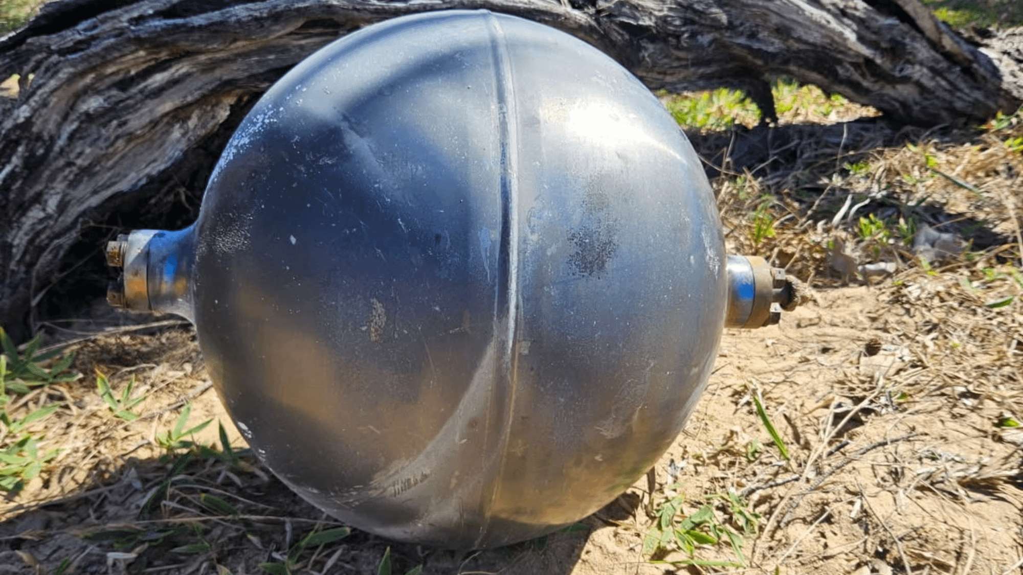 image for Experts Say Australia’s Mysterious Metallic Beach Orbs Are Likely Fallen Space Junk and Highly Toxic