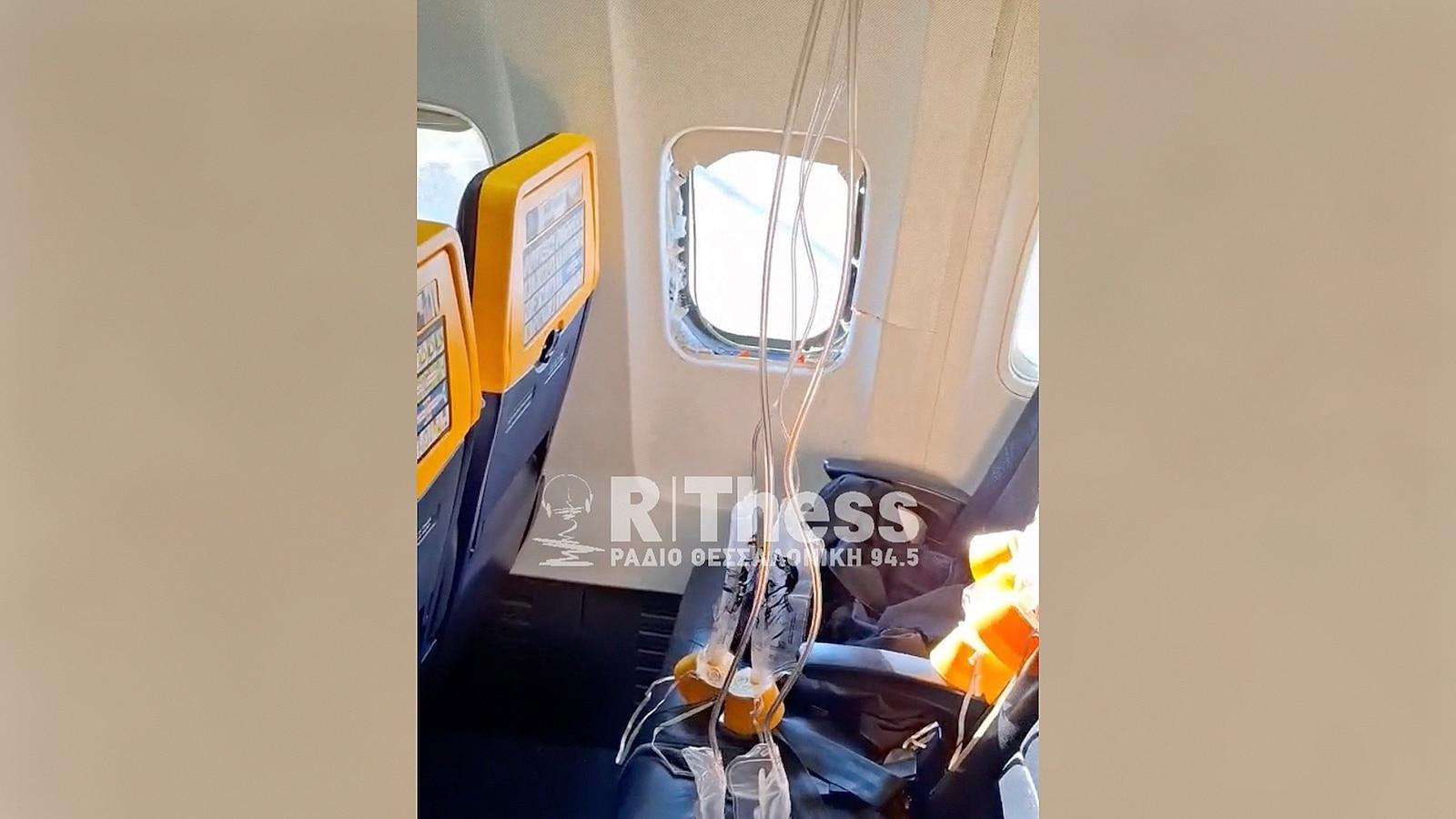 image for Passenger window on Ryanair flight dislodges, partially sucking out passenger