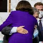 image for Senators Dianne Feinstein and Lindsey Graham unmasked and embracing in October 2020