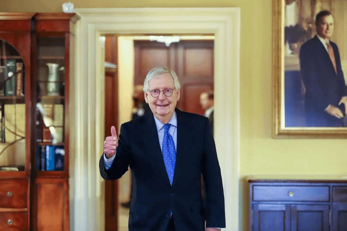 image for Mitch McConnell Photo Sparks Suspicion: No Tubes, No Wires, Just Jeans and a Newspaper