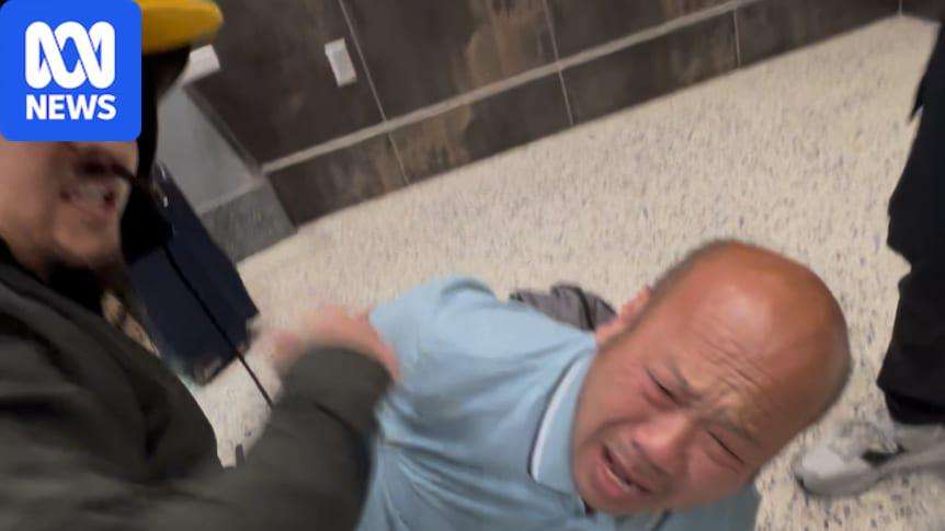 image for Australian man Phu Nguyen handcuffed by plain-clothes ICE agents at Las Vegas International airport