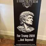 image for A poster at CPAC promoting a third term for Trump