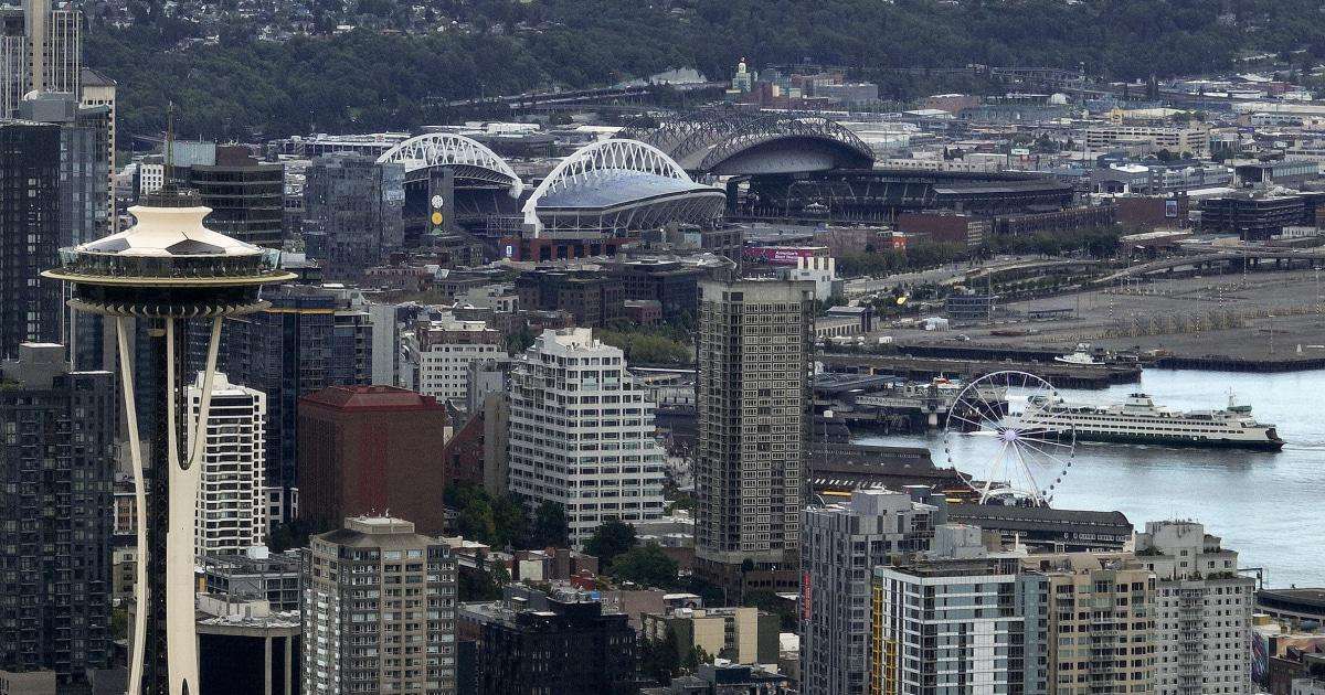 image for Shootout at Seattle food festival kills 3; police arrest suspect and search for another