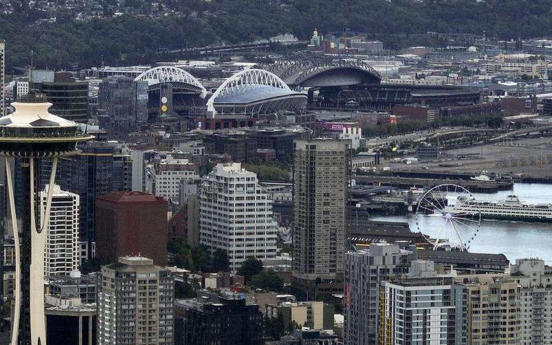 image for Shootout at Seattle food festival kills 3; police arrest suspect and search for another